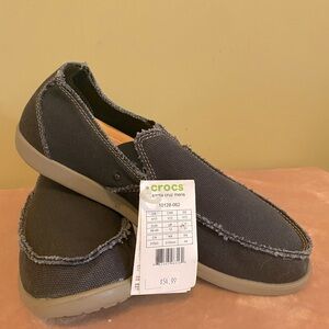 Mens never worn navy size 13 Crocs boat shoes.